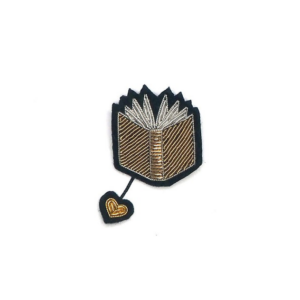 Broche looking for the book